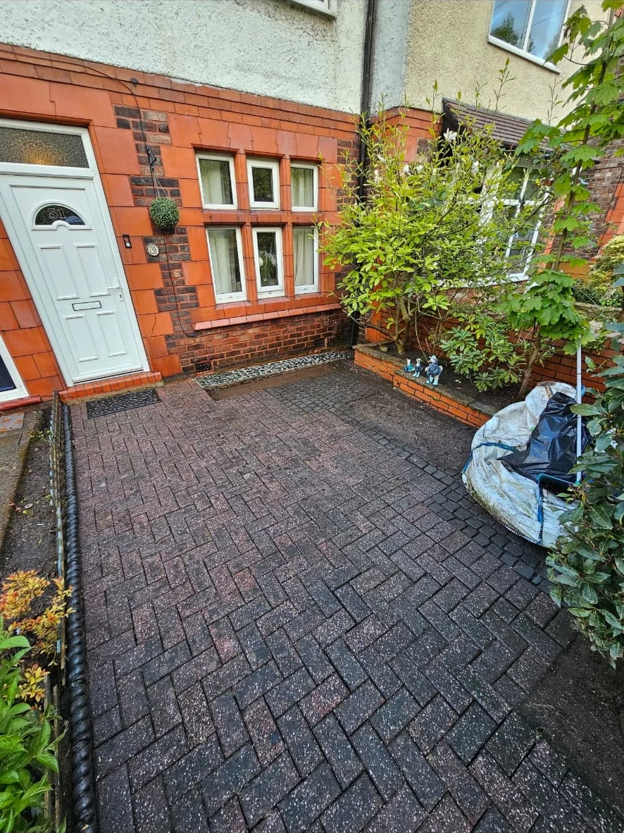 Cleaned block paved path and frontage after clearance work
