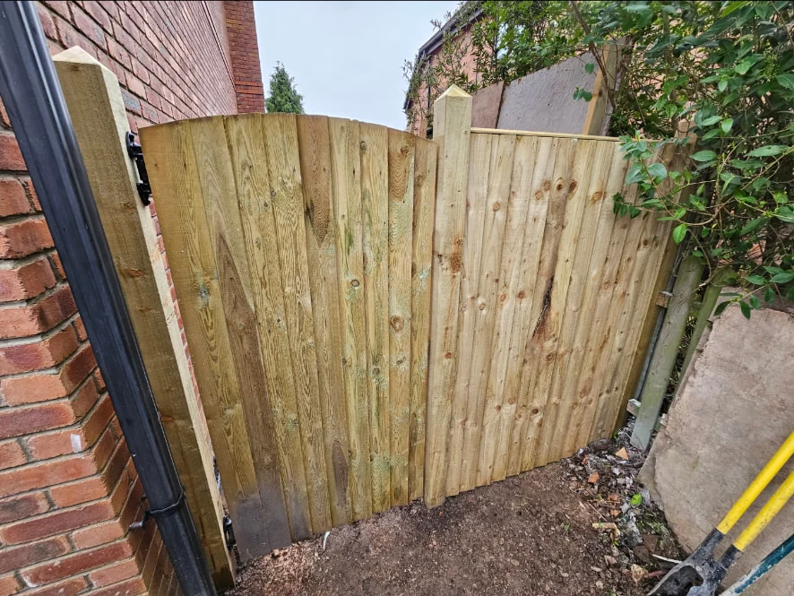 New close-board timber gate and fence panel fitted to a side access